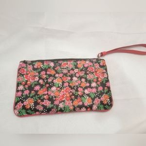 Coach wristlet clutch. Black with floral pattern